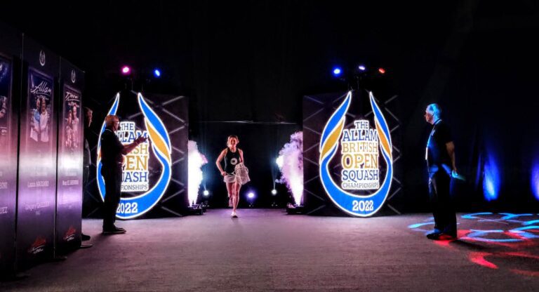 image of female squash player running through smoke and bright lights with Allam British Open 22